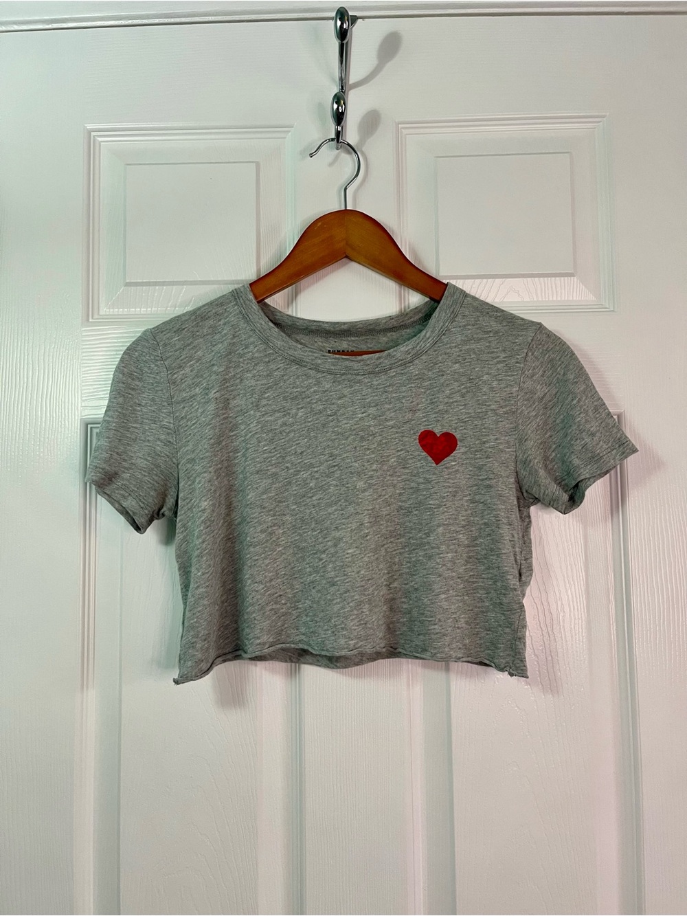 Grey crop with heart